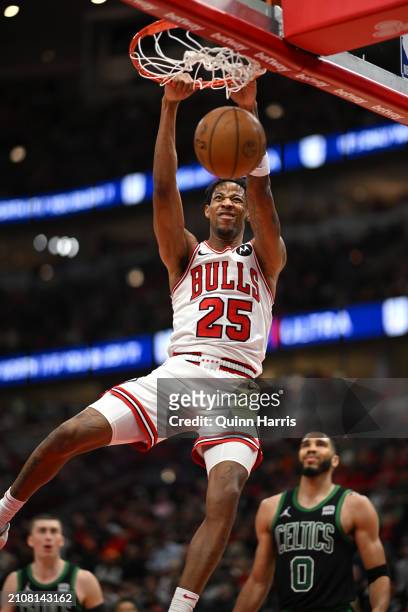 Dalen Terry of the Chicago Bulls dunks in the second half against the Boston Celtics at the United Center on March 23, 2024 in Chicago, Illinois....