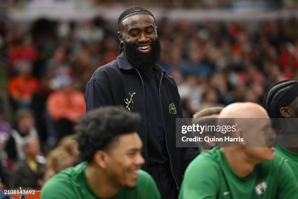 Jaylen Brown of the Boston Celtics laughs from the bench during the second half against the Chicago Bulls at the United Center on March 23, 2024 in...