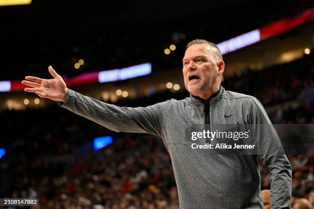 Head coach Michael Malone of the Denver Nuggets gestures during the first quarter of the game against the Portland Trail Blazers at the Moda Center...