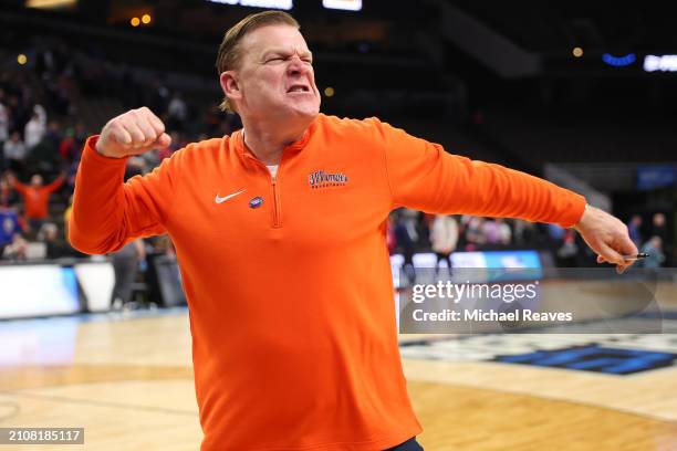 Head coach Brad Underwood of the Illinois Fighting Illini celebrates after defeating the Duquesne Dukes 89-63 in the second round of the NCAA Men's...