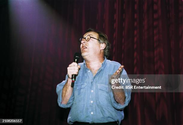 Dutch comedian and columnist Youp van 't Hek , performing live on stage