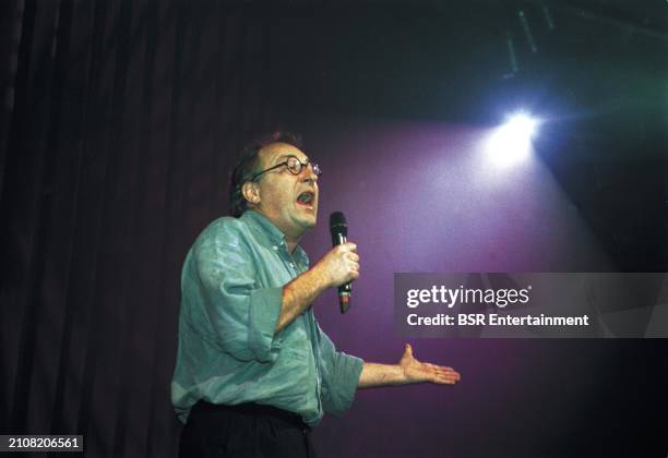 Dutch comedian and columnist Youp van 't Hek , performing live on stage