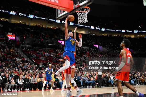 Aaron Gordon of the Denver Nuggets goes for a dunk during the second quarter of the game against the Portland Trail Blazers at the Moda Center on...