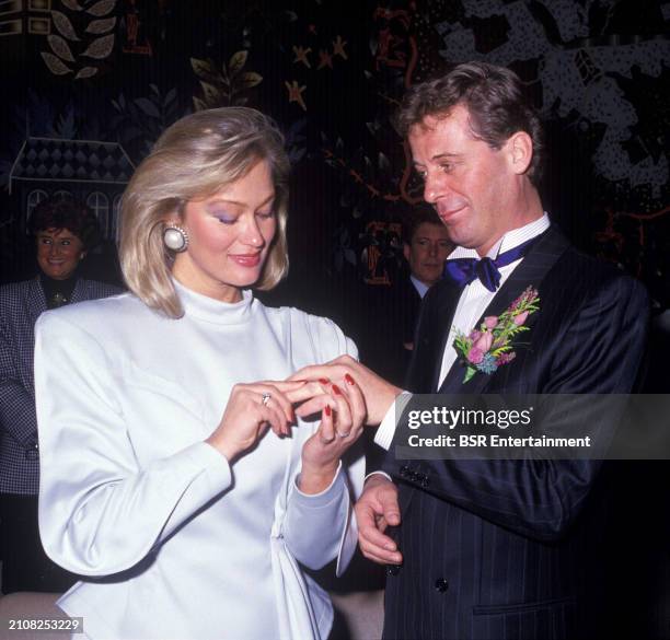 Dutch conductor, composer and arranger Harry van Hoof with wife Els van Hoof during their wedding