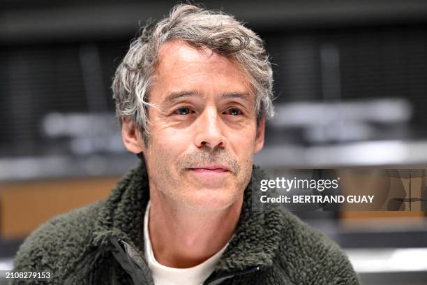 French TV host and producer of the show "Quotidien" Yann Barthes poses ahead of his hearing before a parliamentary enquiry commission into the...