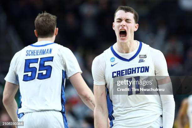 Ryan Kalkbrenner and Francisco Farabello of the Creighton Bluejays react during a second overtime of a game against the Oregon Ducks in the second...