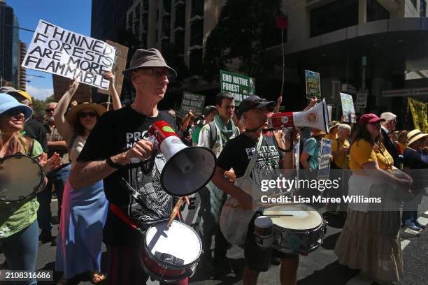 Activists take part in "March In March For Forests" on March 24, 2024 in Sydney, Australia. The "March in March for Forests" is a nationwide mass...