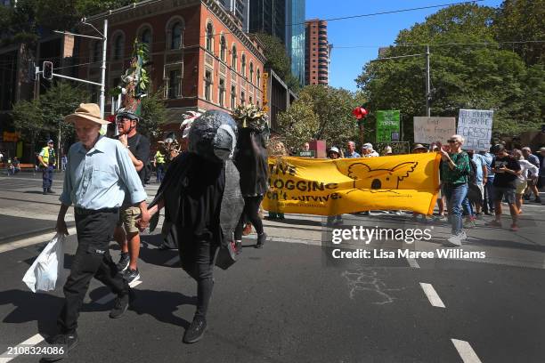 Activists take part in "March In March For Forests" on March 24, 2024 in Sydney, Australia. The "March in March for Forests" is a nationwide mass...