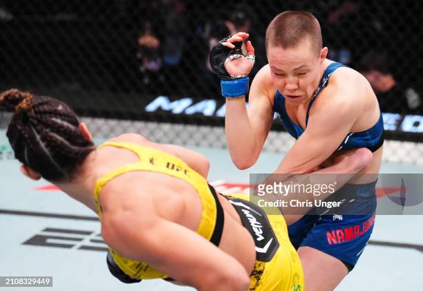 Amanda Ribas of Brazil kicks Rose Namajunas in a flyweight fight during the UFC Fight Night event at UFC APEX on March 23, 2024 in Las Vegas, Nevada.