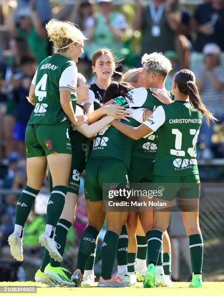 Canberra United players celebnrate a goal by Michelle Heyman during the A-League Women round 21 match between Canberra United and Wellington Phoenix...