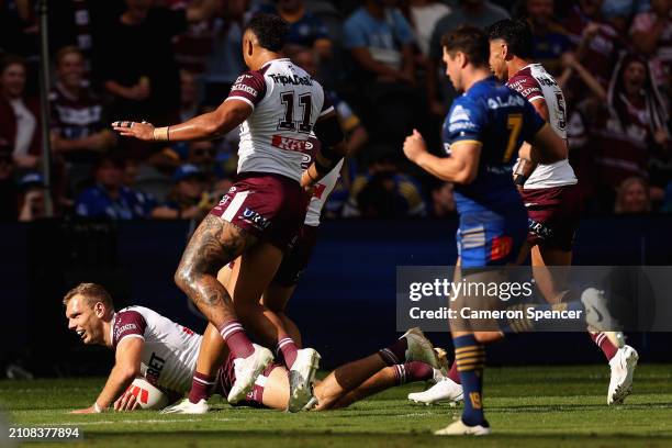 Tom Trbojevic of the Sea Eagles scores a try during the round three NRL match between Parramatta Eels and Manly Sea Eagles at CommBank Stadium, on...