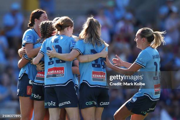 Caley Tallon-Henniker celebrates with her team after scoring a goal during the A-League Women round 21 match between Sydney FC and Adelaide United at...
