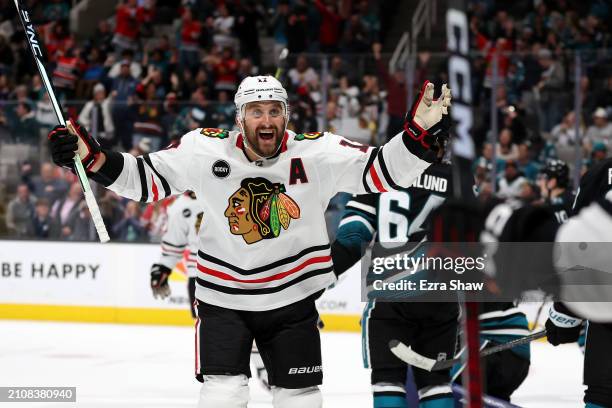 Nick Foligno celebrates after Philipp Kurashev of the Chicago Blackhawks celebrates after he scored the game-tying goal with less than a minute to...