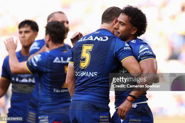 Will Penisini of the Eels celebrates scoring a try with Sean Russell of the Eels during the round three NRL match between Parramatta Eels and Manly...