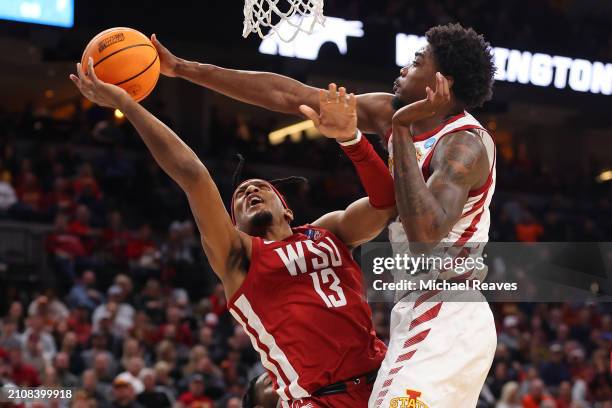 Hason Ward of the Iowa State Cyclones blocks a shot by Isaac Jones of the Washington State Cougars during the second half in the second round of the...