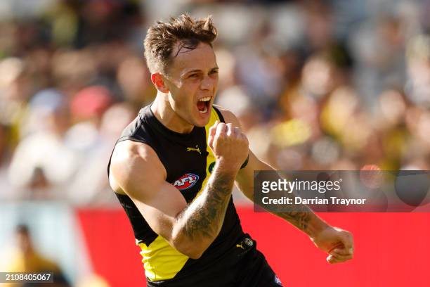 Rhyan Mansell of the Tigers celebrates a goal during the round two AFL match between Richmond Tigers and Port Adelaide Power at Melbourne Cricket...