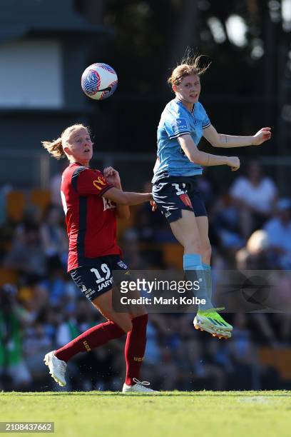 Courtney Vine of Sydney FC heads the ball under pressure from Maruschka Waldus of Adelaide United during the A-League Women round 21 match between...