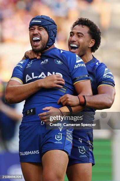 Kelma Tuilagi of the Eels celebrates scoring a try with Will Penisini of the Eels during the round three NRL match between Parramatta Eels and Manly...