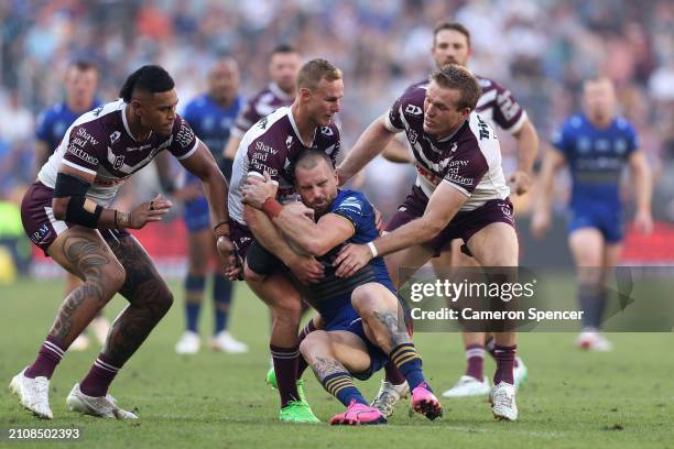 Clint Gutherson of the Eels is tackled during the round three NRL match between Parramatta Eels and Manly Sea Eagles at CommBank Stadium, on March 24...