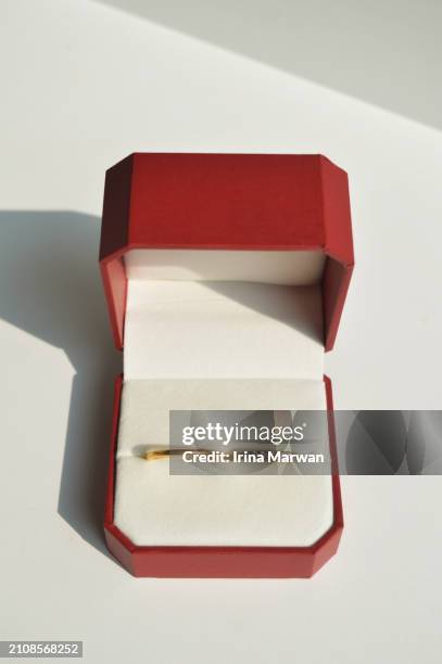 wedding ring and a ring box - jewellery box stock pictures, royalty-free photos & images