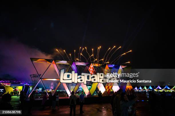 The Lollapalooza entrance sign at night with fireworks during day two of Lollapalooza Brazil at Autodromo de Interlagos on March 23, 2024 in Sao...