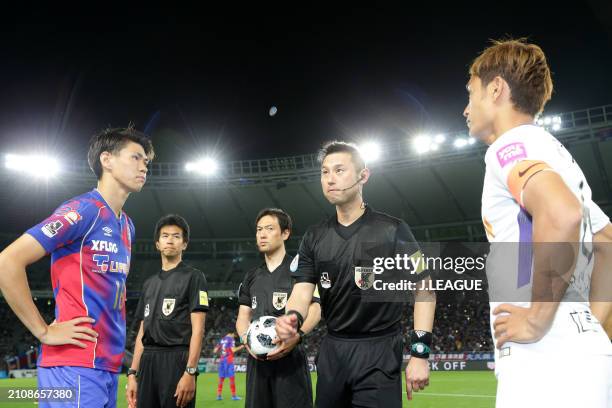 Captains Kento Hashimoto of FC Tokyo and Toshihiro Aoyama of Sanfrecce Hiroshima attend the coin toss prior to the J.League J1 match between FC Tokyo...