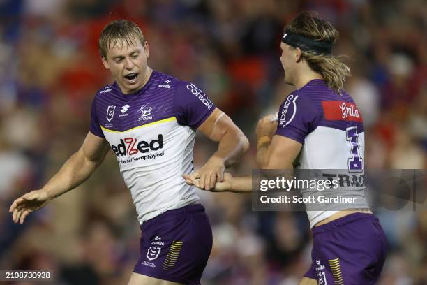Tyran Wishart of the Storm celebrates his try during the round three NRL match between Newcastle Knights and Melbourne Storm at McDonald Jones...