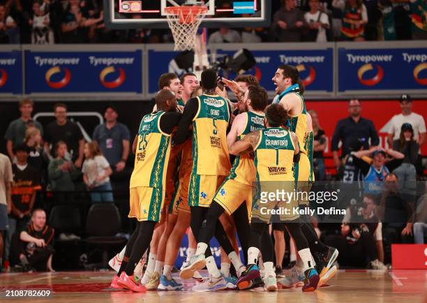 JackJumpers celebrate winning during game three of the NBL Championship Grand Final Series between Melbourne United and Tasmania JackJumpers at John...