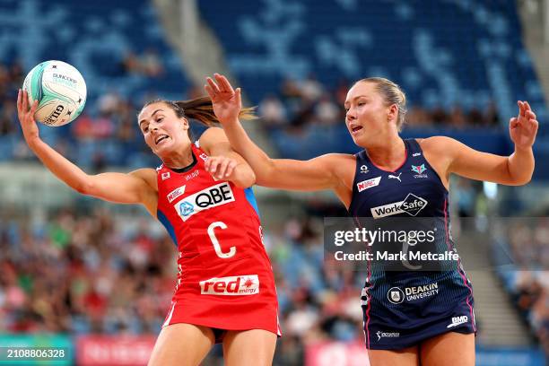Hannah Mundy of the Vixens and Maddy Proud of the Swifts compete for the ball during the 2024 Suncorp Team Girls Cup match between the Vixens and the...