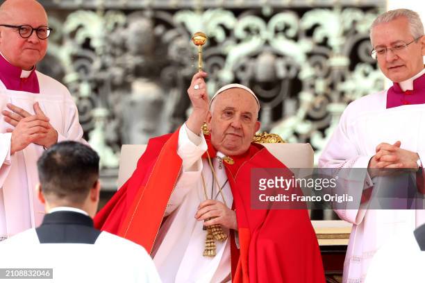 Pope Francis blesses palms as he presides over Palm Sunday Mass at St. Peter's Suare on March 24, 2024 in Vatican City, Vatican.