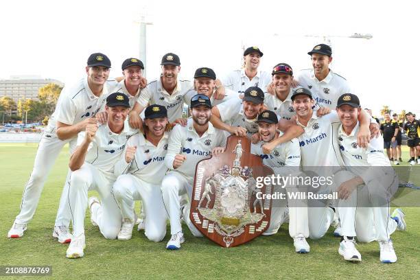 Western Australia pose after winning the Sheffield Shield Final match between Western Australia and Tasmania at WACA, on March 24 in Perth, Australia.