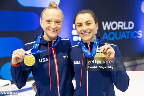 Sarah Bacon and Kassidy Cook of Team USA pose with gold medal after the Women's Synchronized 3m Springboard Final during the World Aquatics Diving...