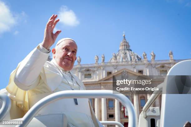 Pope Francis waves to the faithful as he leaves St. Peter's Square at the end of Palm Sunday Mass on March 24, 2024 in Vatican City, Vatican.