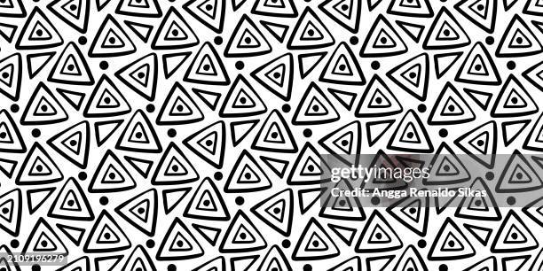 geometric seamless pattern black dots and striped triangle shapes on white background - tribal pattern stock illustrations