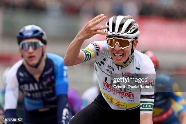 Tadej Pogacar of Slovenia and UAE Emirates Team - Green Leader Jersey celebrates at finish line as stage winner during the 103rd Volta Ciclista a...