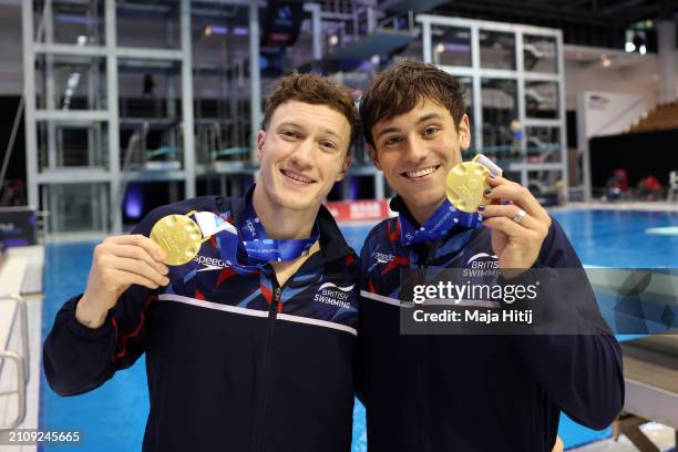 Gold medalists Noah Williams and Thomas Daley of Team Great Britain pose for a photo with their medals after the medal ceremony for the Men's...