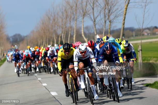 Mathieu van der Poel of The Netherlands and Team Alpecin - Deceuninck and Lewis Askey of The United Kingdom and Team Groupama - FDJ lead the peloton...