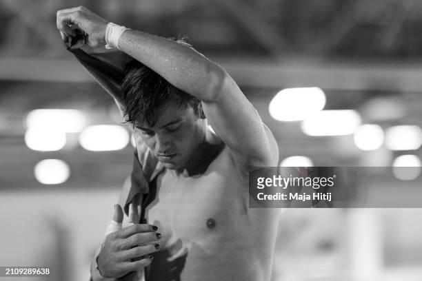Thomas Daley of Team Great Britain looks on during training prior the Men's Synchronized 10m Platform Final during the World Aquatics Diving World...
