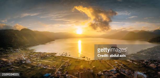 takengon lake (danau air tawar) sunrise, takengon, central aceh, indonesia - abdul stock pictures, royalty-free photos & images