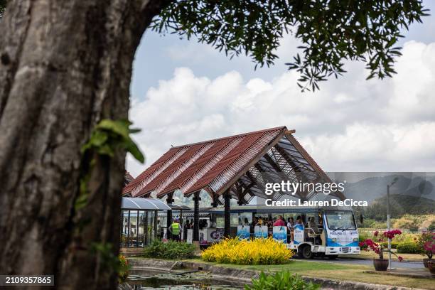Tourists board the airport train at Koh Samui Airport on March 24, 2024 in Phuket, Thailand. Thailand's tourism sector is experiencing a notable...