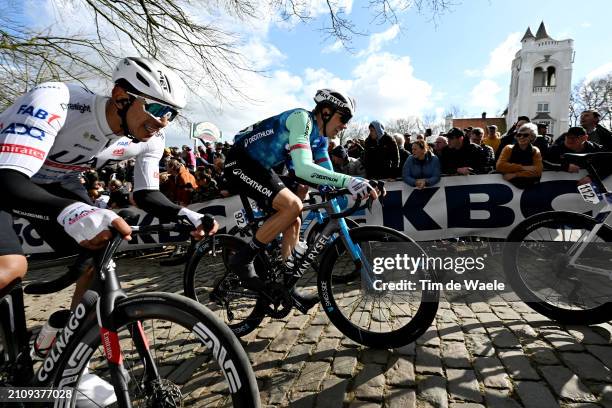 Antonio Morgado of Portugal and UAE Team Emirates and Edvald Boasson Hagen of Norway and Decathlon AG2R La Mondiale Team compete passing through the...