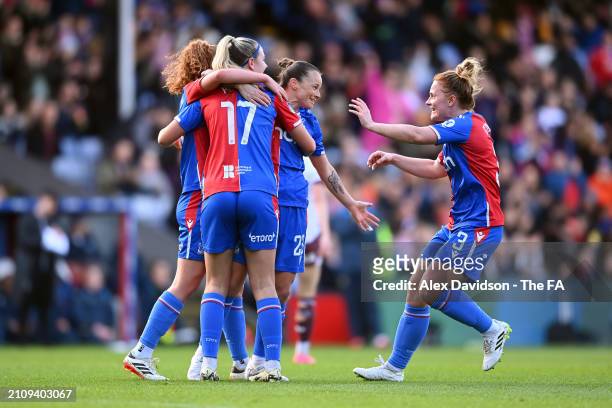 Ria Percival of Crystal Palace celebrates scoring her team's second goal with team mates Fliss Gibbons and Lexi Potter during the Barclays Women's...