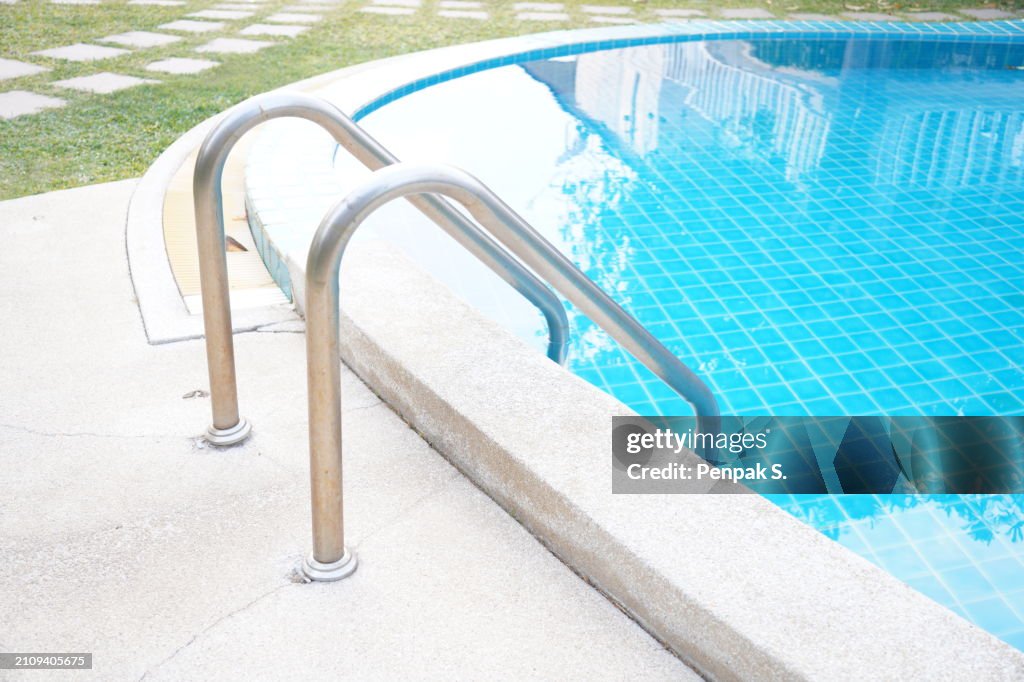 Step stair swimming pool reflect off the pool.