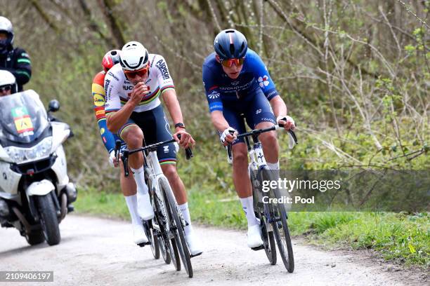 Mathieu van der Poel of The Netherlands and Team Alpecin - Deceuninck and Laurence Pithie of New Zealand and Team Groupama - FDJ compete in the...