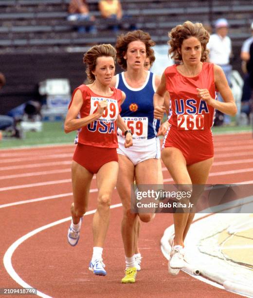 United States Long Distance Runners Brenda Webb and Maggie Keyes during 3000 meters race at United States vs East Germany track meet in Los Angeles...