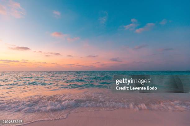 sea sand sky concept, sunset colors clouds, horizon, horizontal background banner. inspirational nature landscape, beautiful colors, wonderful scenery of tropical beach. beach sunset, summer vacation - indian ocean stock pictures, royalty-free photos & images