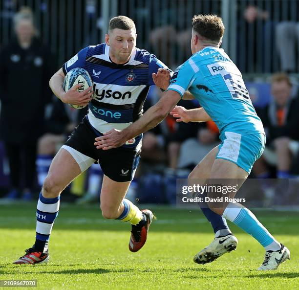 Finn Russell of Bath takes on George Ford during the Gallagher Premiership Rugby match between Bath Rugby and Sale Sharks at the Recreation Ground on...