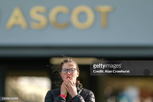 Groom shows emotions as the race nears its end at Ascot Racecourse on March 24, 2024 in Ascot, England.