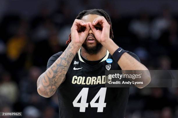 Eddie Lampkin Jr. #44 of the Colorado Buffaloes celebrates a basket against the Marquette Golden Eagles during the first half in the second round of...