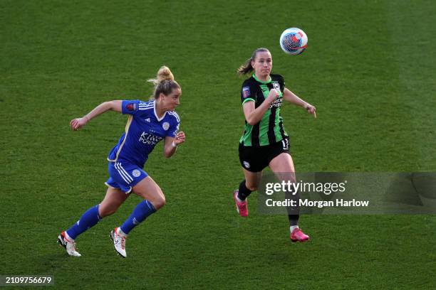 Sophie Howard of Leicester City and Elisabeth Terland of Brighton & Hove Albion battle for possession during the Barclays Women's Super League match...